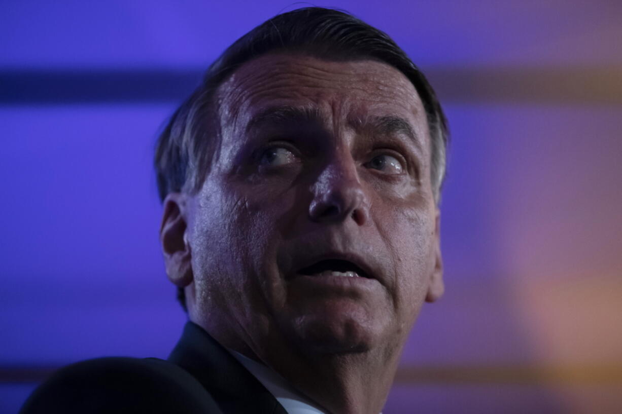 Brazilian President Jair Bolsonaro, who is running for a second term, attends a press conference after a presidential debate in Rio de Janeiro, Brazil, Saturday, Oct. 29, 2022. Bolsonaro will face former president of Brazil Luiz Inacio Lula da Silva in the presidential runoff on Oct. 30.