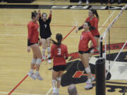 Members of the Camas volleyball team celebrate a point during the Papermakers' win over Skyview at Camas High School on Thursday, Oct. 27, 2022.