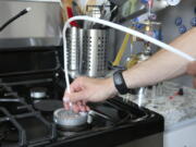 In this 2022 image provided by PSE Healthy Energy, a gas stove is tested for benzene in California. Stoves in California homes are leaking the cancer-causing gas benzene, researchers found in a new study published on Thursday, Oct. 20, though they say more research is needed to understand how many homes have leaks.