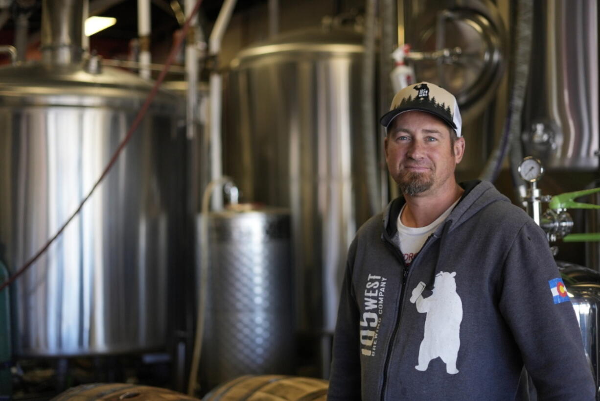 Eric Seufert, owner and manager of 105 West Brewing Co., poses for a photo at his brewery room Tuesday, Oct. 18, 2022, in Castle Rock, Colo. Brewing beer, cooking food, and refilling water bottles with recycled wastewater could soon become standard practice in a state that's synonymous with its pristine-tasting snowmelt and mountain springs.