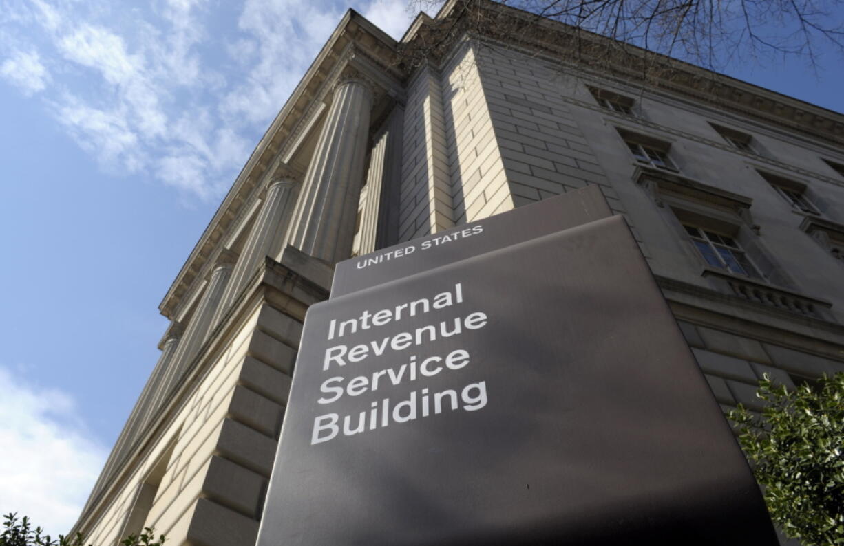 FILE - The exterior of the Internal Revenue Service (IRS) building in Washington on March 22, 2013. The IRS said Thursday, Oct. 27, 2022, that it has hired an additional 4,000 customer service representatives who are being trained to answer taxpayer questions during the 2023 tax filing season.