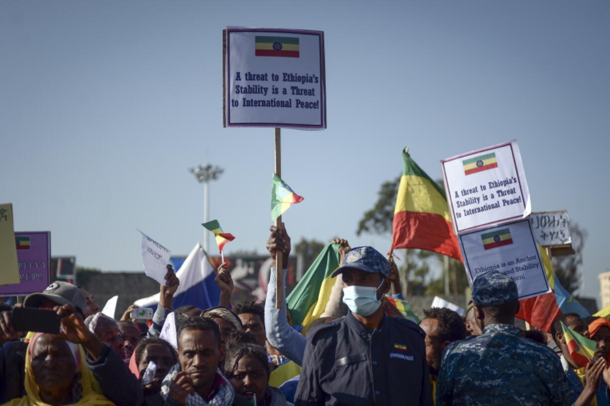 FILE - Ethiopians protest against what they say is interference by outsiders in the country's internal affairs and against the Tigray People's Liberation Front (TPLF), the party of Tigray's fugitive leaders, at a rally organized by the city administration in the capital Addis Ababa, Ethiopia Saturday, Oct. 22, 2022. A South Africa government spokesman says African Union-led peace talks to end Ethiopia's Tigray conflict have begun in South Africa on Tuesday, Oct. 25, 2022.