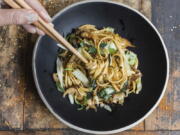 This image released by Milk Street shows a recipe for Yakiudon with Pickled Ginger.