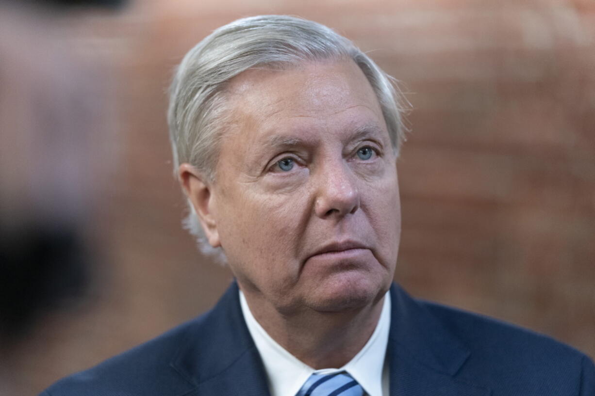 FILE - Sen. Lindsey Graham, R-S.C., speaks with reporters on Capitol Hill in Washington, March 16, 2022. Graham on Friday, Oct. 21, asked the U.S. Supreme Court to intervene after a lower court ordered him to testify before a special grand jury in Georgia investigating whether then-President Donald Trump and others illegally tried to influence the 2020 election in the state.