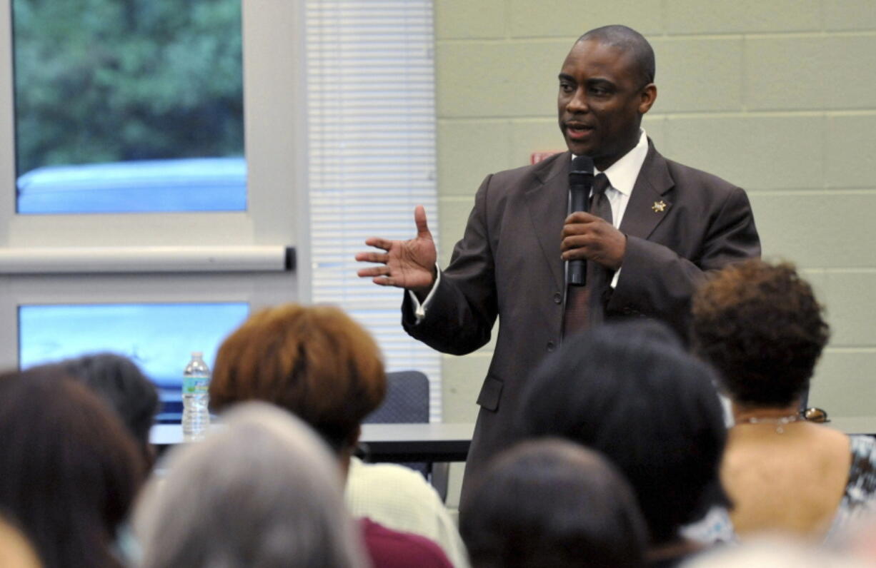 FILE - Clayton County Sheriff Victor Hill speaks at a candidate forum in Rex, Ga., on Aug. 16, 2012. Hill stands accused of punishing detainees by having them strapped into a restraint chair for hours even though they posed no threat and obeyed instructions. A federal grand jury in April 2021 indicted Hill, saying he violated the civil rights of four people in his custody.  Jury selection is set to begin Wednesday, Oct. 12, 2022, and the trial is expected to last at least two weeks.  (Kent D.