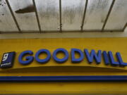 FILE - A Goodwill store sign is shown in Berkeley, Calif., Tuesday, March 9, 2021. Goodwill Industries International Inc., the 120 year-old non-profit organization that operates 3,300 stores in the U.S., and Canada,  has launched an online business, as part of a newly incorporated recommerce venture called GoodwillFinds.