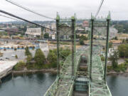 The northern drawbridge towers of the Interstate 5 Bridge rise above Downtown Vancouver on Wednesday, Oct. 5, 2022.