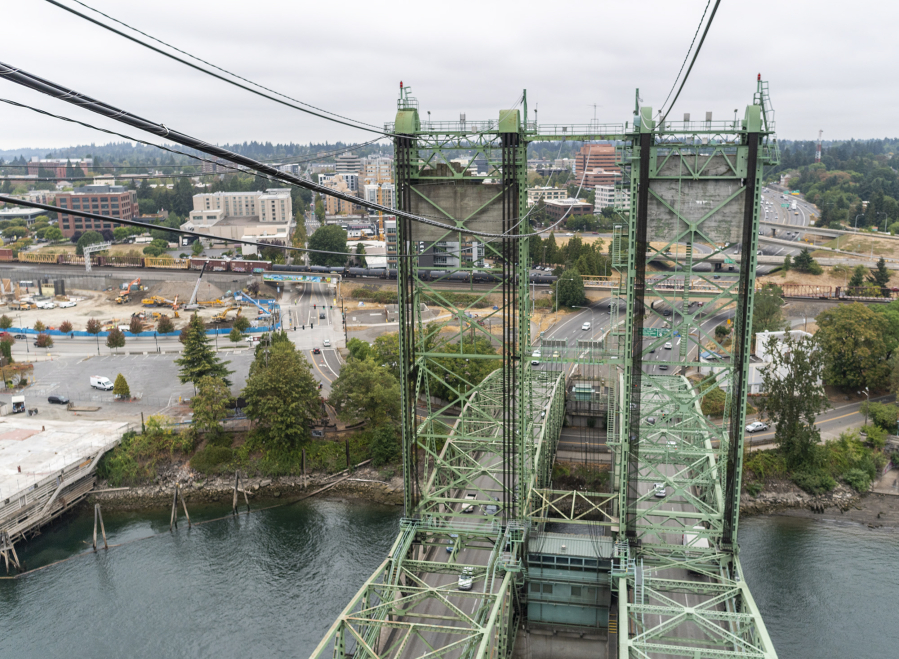 The northern drawbridge towers of the Interstate 5 Bridge rise above Downtown Vancouver on Wednesday, Oct. 5, 2022.