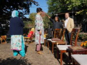 Zafar Siddiqui, right, and other members of the "India Coalition" group gather Oct. 9 at the Minneapolis home of Dipankar Mukherjee, second right, and Meena Natarajan. The group - representing believers in different faiths as well as atheists - meets monthly to discuss how to prevent religious tensions in India from spreading to the Indian diaspora in the United States.