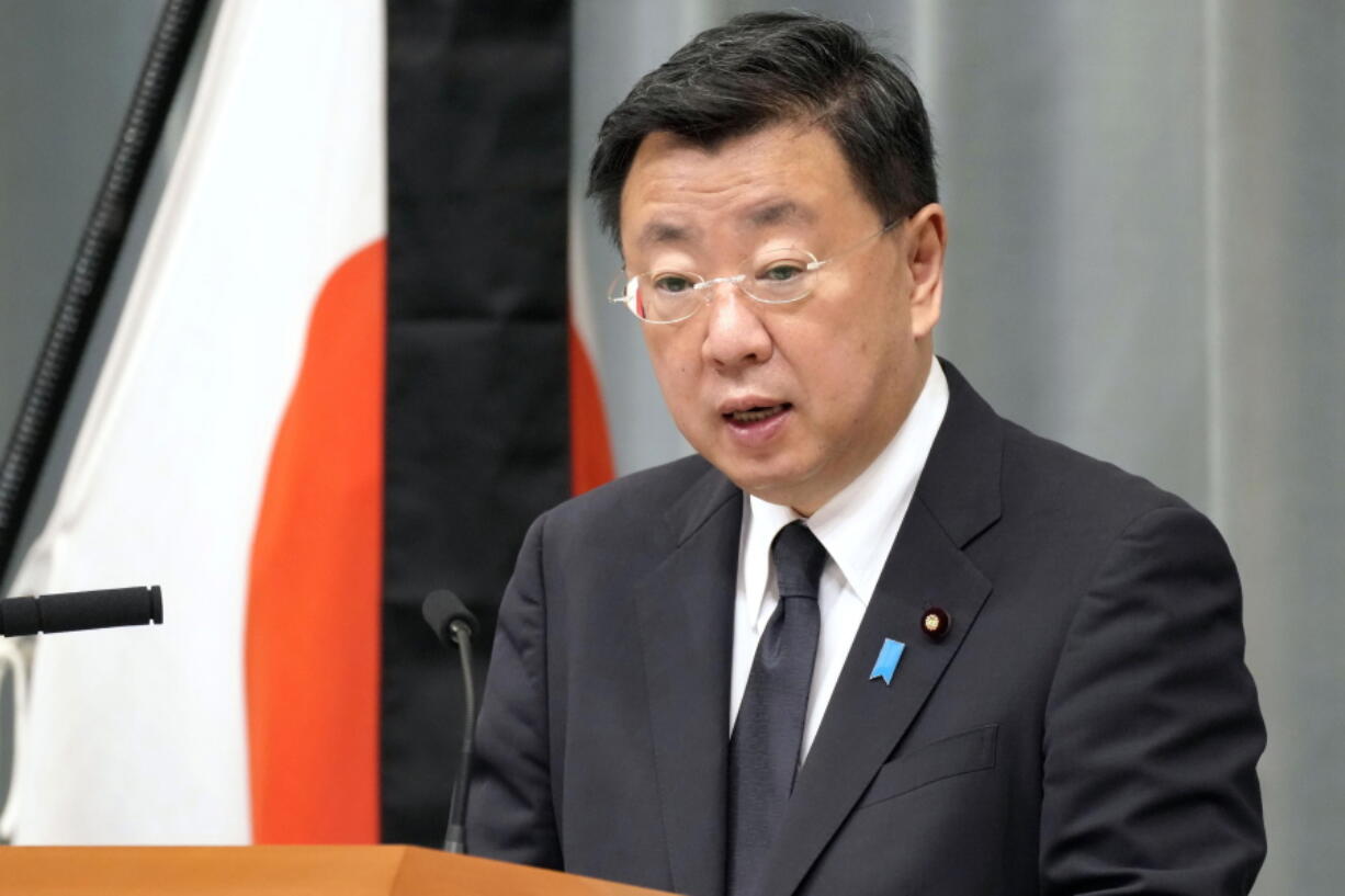 Japan's Chief Cabinet Secretary Hirokazu Matsuno speaks at a press conference in Tokyo Tuesday, Sept. 27, 2022. Japan protested to Russia on Tuesday over a detention of a Japanese consulate official over espionage allegations, denying the allegations and accusing Russian authorities of abusive interrogation.