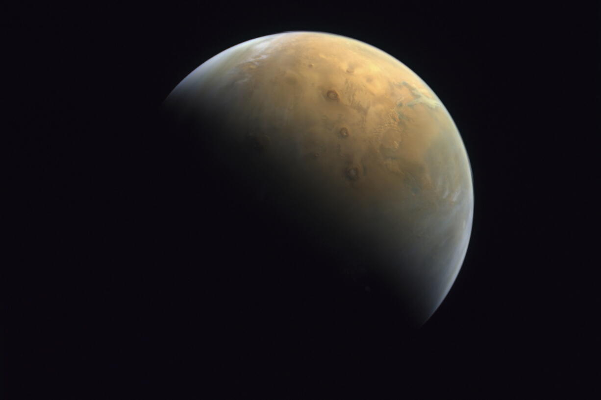 FILE - This image captured by the United Arab Emirates' "Amal" ("Hope") probe shows the planet Mars on Feb. 10, 2021. Ancient Mars may have had an environment capable of harboring an underground world teeming with microscopic organisms. That's according to French scientists who published their findings Monday, Oct. 10, 2022.