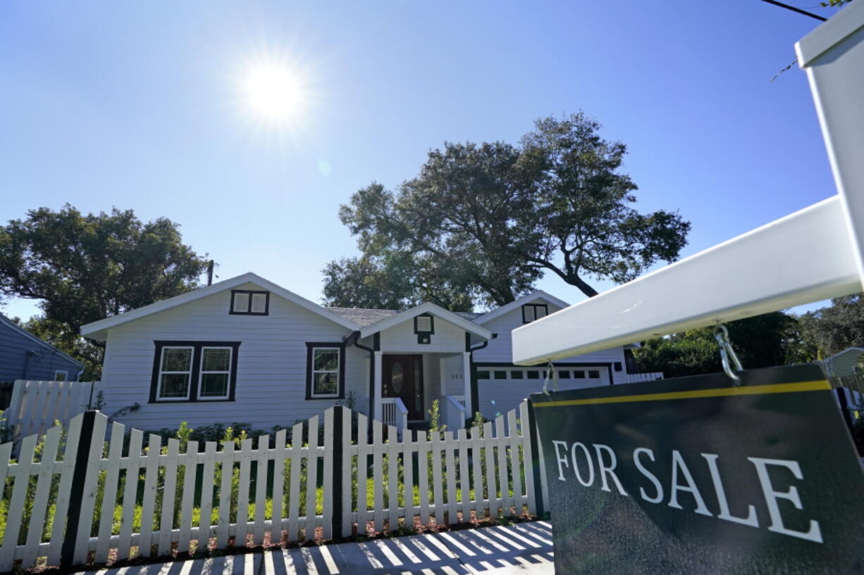 FILE - A home for sale is seen on Dec. 8, 2020, in Orlando, Fla. Sales of previously occupied U.S. homes fell in September 2022 for the eighth month in a row, matching the pre-pandemic sales pace from 10 years ago, as house hunters faced sharply higher mortgage rates, higher home prices and a still tight supply of properties on the market.