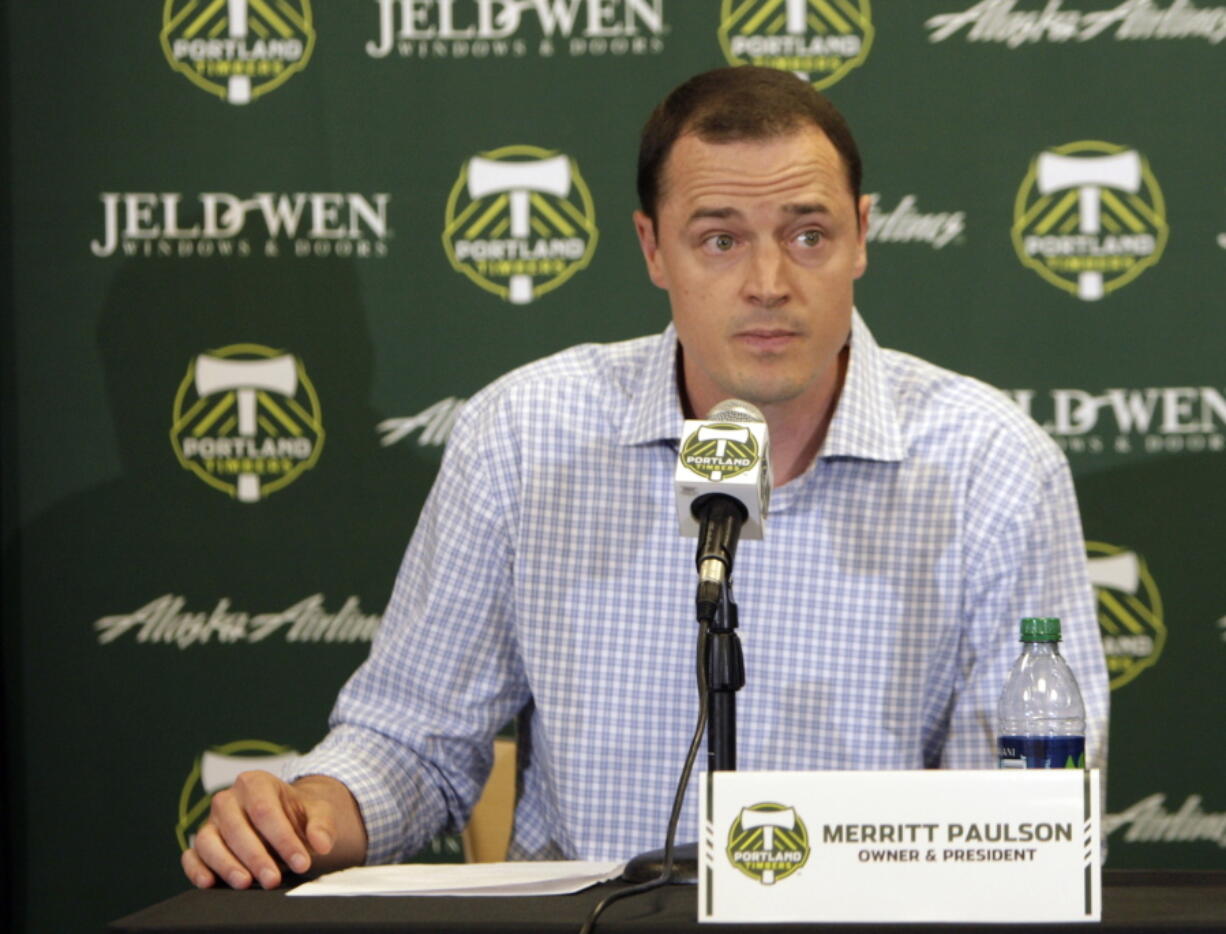 FILE - Portland Timbers president Merritt Paulson speaks during a soccer news conference announcing the firing of Timbers coach John Spencer on July 9, 2012, in Portland, Ore. Paulson, who also owns the Portland Thorns women soccer team, has removed himself from a decision-making role with the National Women's Soccer League club until the findings are released from an ongoing investigation into numerous scandals around the league.