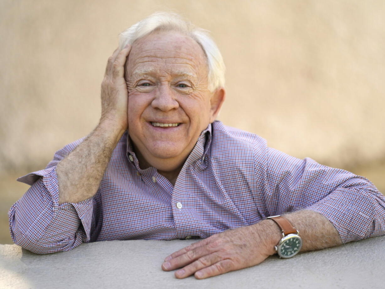 FILE - Leslie Jordan poses for a portrait at Pan Pacific Park in the Fairfax district of Los Angeles on Thursday, April 8, 2021 to promote his new book "How Y'all Doing?: Misadventures and Mischief from a Life Well Lived." Jordan, the Emmy-winning actor whose wry Southern drawl and versatility made him a comedy and drama standout on TV series including "Will & Grace" and "American Horror Story," has died. He was 67.