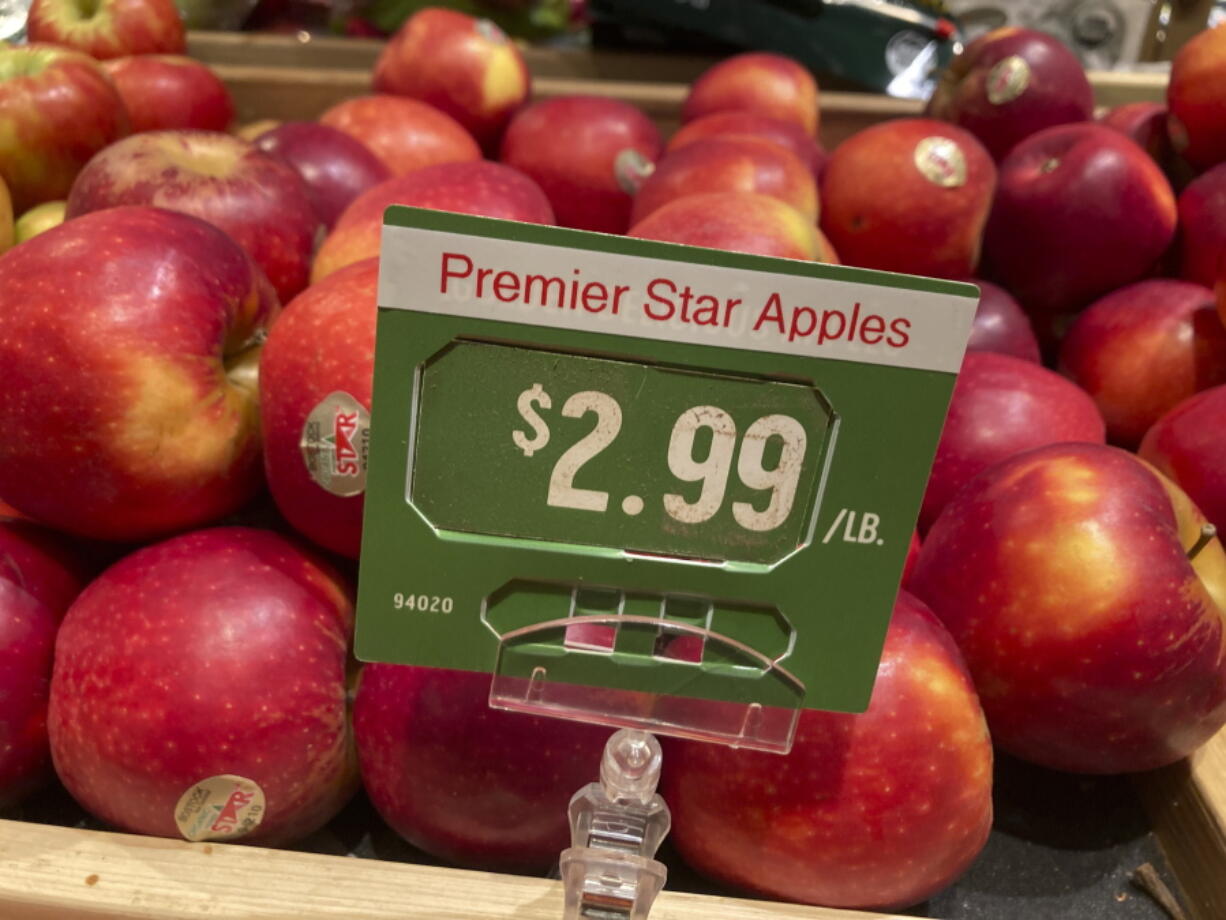 FILE - Shown is the price of apples at a market in Philadelphia, Thursday, June 16, 2022. Inflation at the wholesale level rose 8.5% in September from a year earlier, its third straight decline though it is still at a painfully high level. Wednesday, Oct.