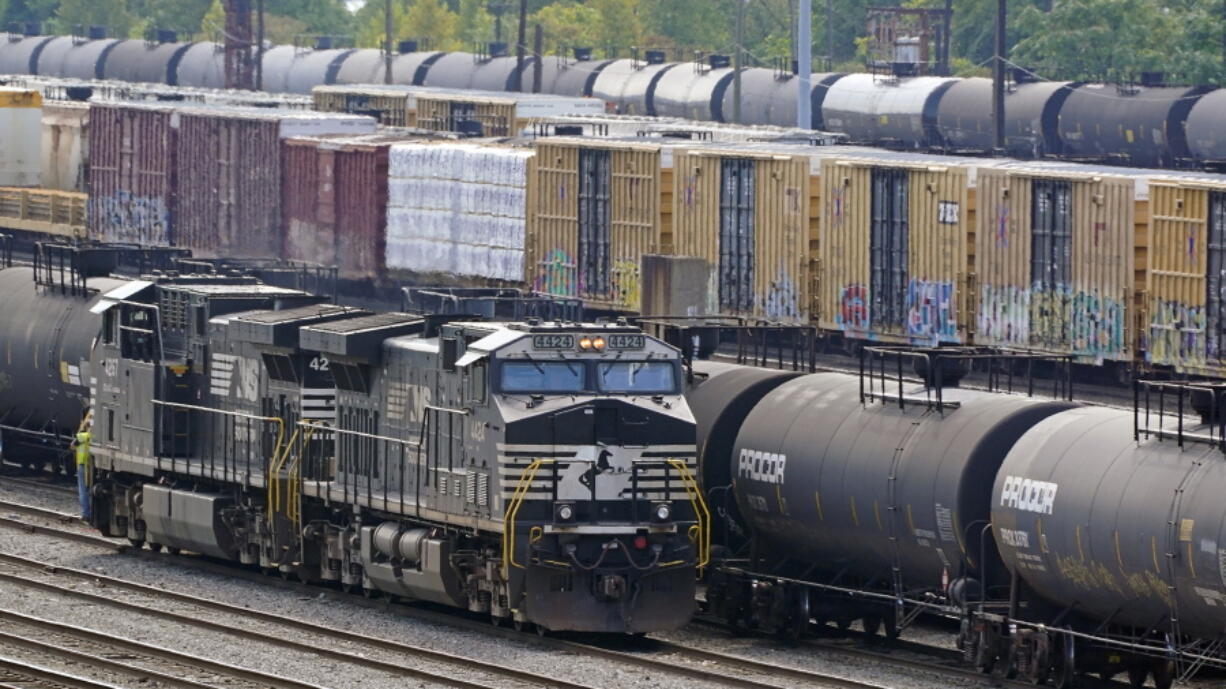 FILE - Norfolk Southern locomotives work in the in the Conway Terminal on Sept. 15, 2022, in Conway, Pa. Another railroad union rejected its deal with the major freight railroads Wednesday, Oct. 26, as workers are increasingly frustrated with the lack of paid sick time in the industry, adding to concerns about the possibility of a strike next month that could cripple the economy. (AP Photo/Gene J.