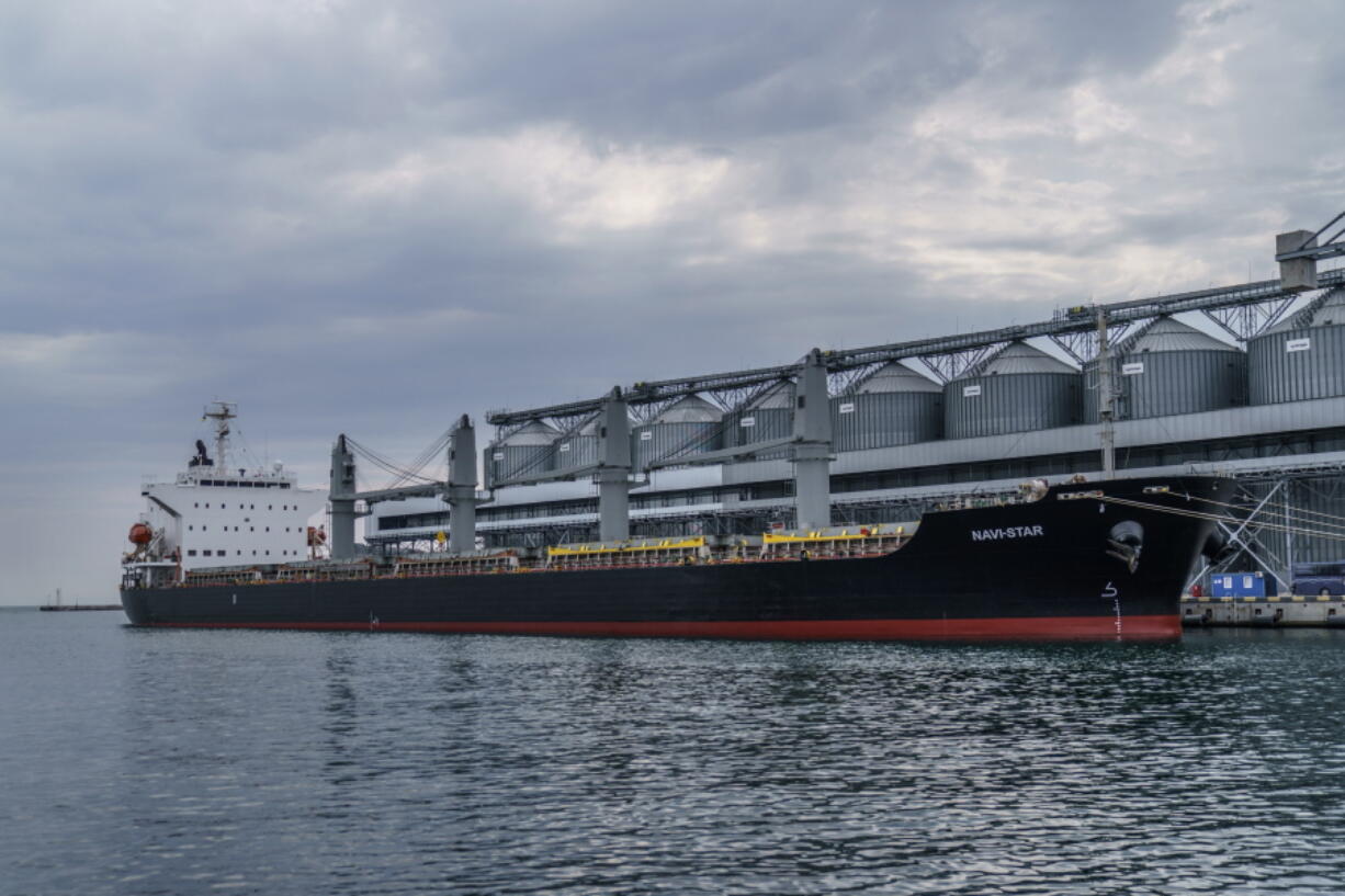 FILE - The ship Navi-Star sits full of grain since Russia's invasion of Ukraine began five months ago as it waits to sail from the Odesa Sea Port, in Odesa, Ukraine, July 29, 2022. U.S. President Joe Biden has warned that global hunger could increase because of Russia's suspension of a U.N.-brokered deal to allow safe passage for ships carrying Ukrainian grain.