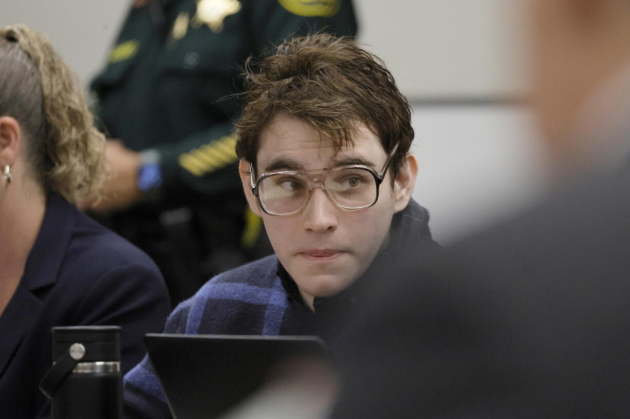 Marjory Stoneman Douglas High School shooter Nikolas Cruz is shown at the defense table during the penalty phase of Cruz's trial at the Broward County Courthouse in Fort Lauderdale on Monday, Oct. 3, 2022. Cruz previously plead guilty to all 17 counts of premeditated murder and 17 counts of attempted murder in the 2018 shootings.