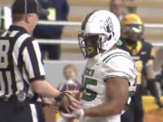 Portland State running back Jojo Siofele hands the ball to an official after scoring a touchdown against Idaho on Saturday, Oct.