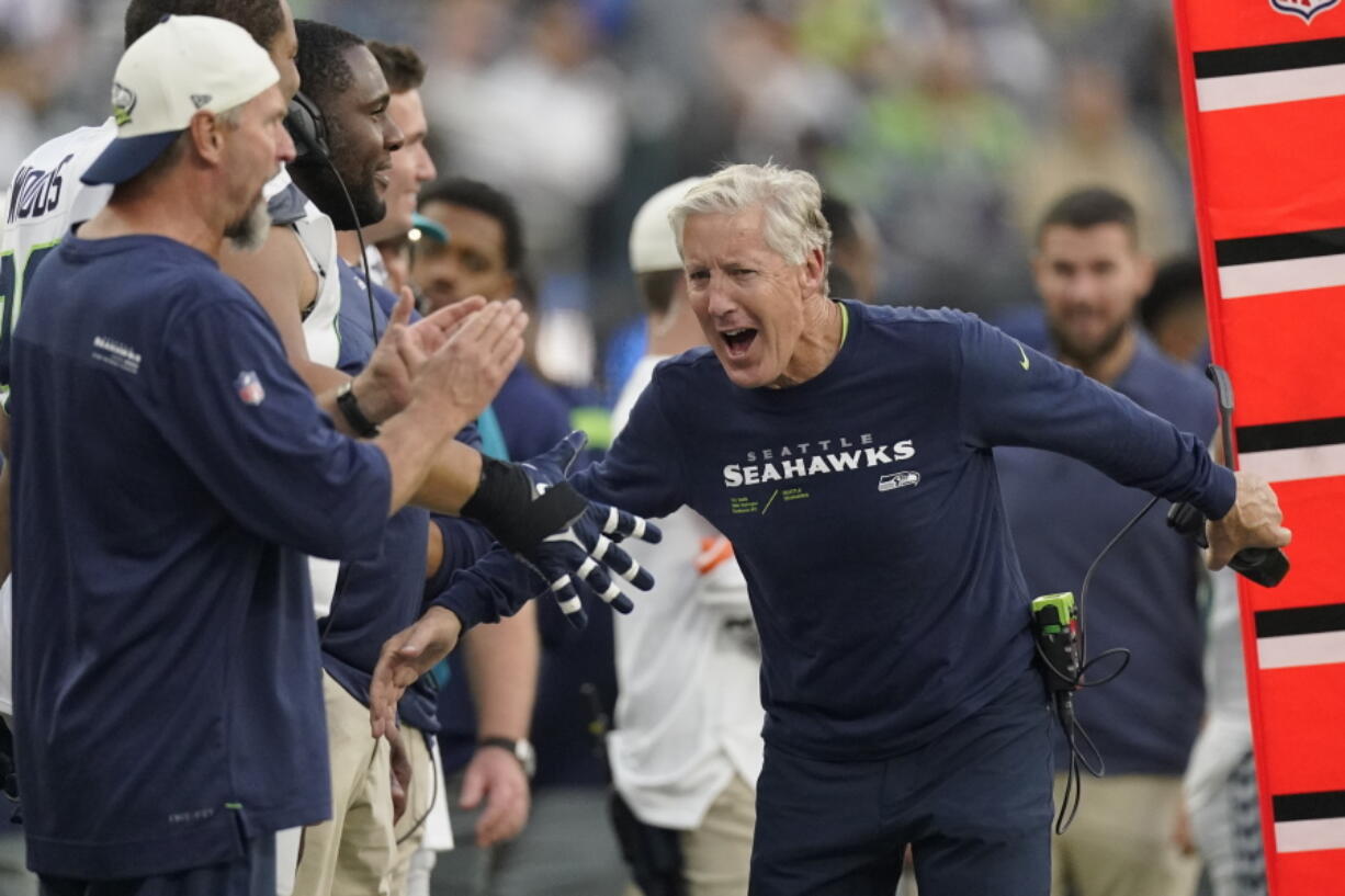 Seattle Seahawks head coach Pete Carroll celebrates at the end of an NFL football game against the Los Angeles Chargers Sunday, Oct. 23, 2022, in Inglewood, Calif. The Seahawks won 37-23. (AP Photo/Mark J.