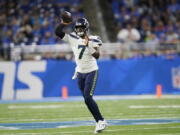 Seattle Seahawks quarterback Geno Smith passes during the first half of an NFL football game against the Detroit Lions, Sunday, Oct. 2, 2022, in Detroit.