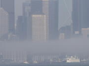 The Seattle skyline is obscured by a thick haze of smoke in October 2022. (Ellen M.