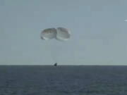 In this image from video made available by NASA, the SpaceX Crew Dragon Freedom capsule approaches surface of the Atlantic Ocean off Florida for splashdown on a return trip from the International Space Station on Friday, Oct. 14, 2022.