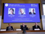 Secretary General of the Royal Swedish Academy of Sciences Hans Ellegren, centre, Jonas Aqvist, Chairman of the Nobel Committee for Chemistry, left, and Olof Ramstrom, member of the Nobel Committee for Chemistry announce the winners of the 2022 Nobel Prize in Chemistry during a press conference at the Royal Swedish Academy of Sciences in Stockholm, Sweden, Wednesday, Oct. 5, 2022. The winners of the 2022 Nobel Prize in chemistry are Caroline R. Bertozzi of the United States, Morten Meldal of Denmark and K. Barry Sharpless of the United States.