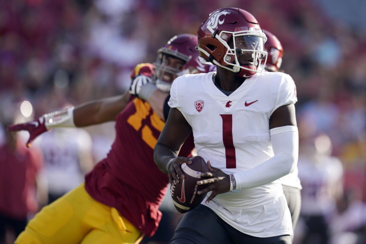 Washington State quarterback Cameron Ward (1) prepares to throw during the first half of an NCAA college football game against Southern California, Saturday, Oct. 8, 2022, in Los Angeles.