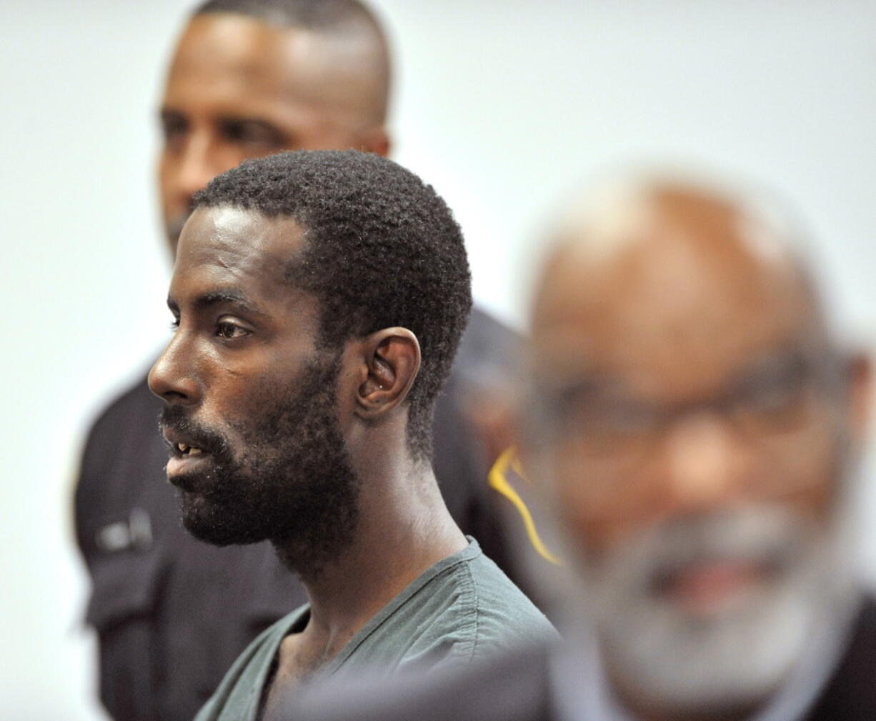 FILE--In this June 20, 2019, file photo Deangelo Martin stands for a probable cause hearing, in Detroit.  Martin was sentenced to at least 45 years in prison after pleading guilty to murdering four women whose bodies were found in vacant houses and to sexually assaulting two other women. A Wayne County Circuit Court judge sentenced Martin on Thursday, Oct. 6, 2022, to 45 to 70 years behind bars.