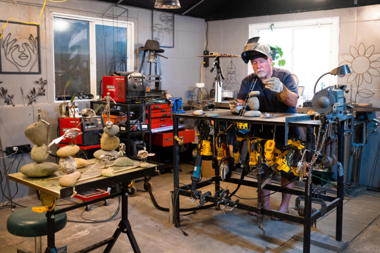 Metal sculptor Larry Holt is a retired precision welder and a self-taught artist who sculpts metal as well as making furniture and jewelry (Contributed by Clark County Open Studios)