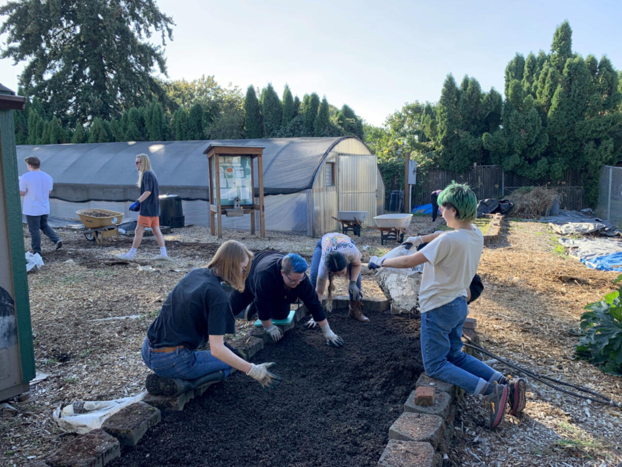 (Photo contributed by Barbara Nordstrom)
Nine students from Kristen Myklebust's Clark College health classes assisted at the Hazel Dell School and Community Garden on Oct. 12.