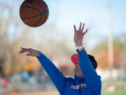 Gavin Dumas, 12, tosses a free throw during the Vancouver Elks 823's Hoop Shoot competition Saturday at Ellsworth Elementary School. He made 18 out of 25 shots.