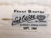 Labels personalized this tuxedo shirt of Frank Sinatra's.