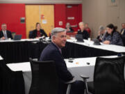 The Washington State University Board of Regents meet for a second day at the Firstenburg Student Commons on the Vancouver campus Friday morning. Following his testimony regarding the state of the Vancouver campus, WSU Vancouver Chancellor Mel Netzhammer, center, took time to hear from virtual attendees. At top, WSU President Kirk Schulz open Friday's meeting  with updates on a handful of construction projects and corporate partnerships.