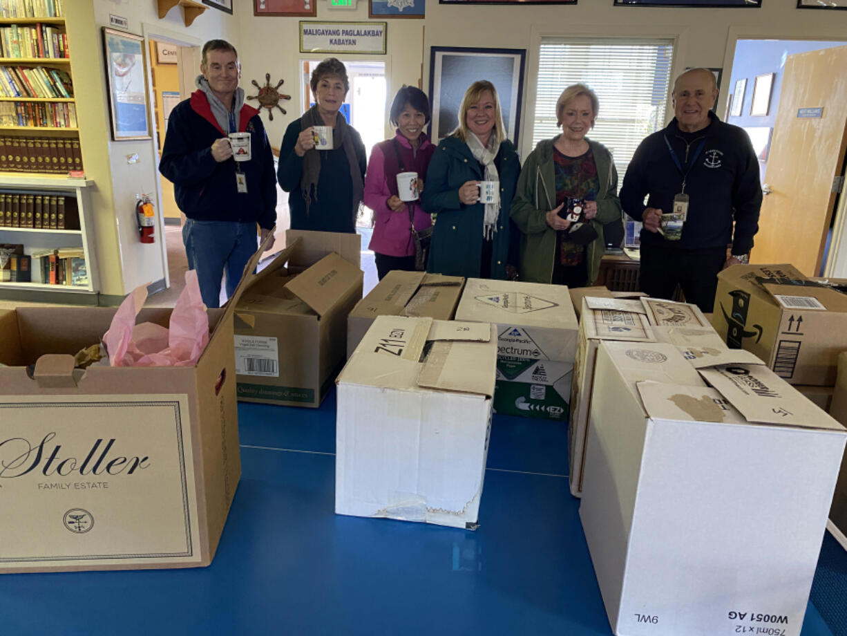 The Clark County Newcomers Club recently donated 246 coffee mugs to the Seafarer's Center at the Port of Vancouver.