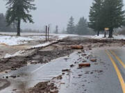 Flood damaged highways and freeways interrupt traffic