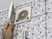 Grime buildup in bathroom exhaust fans makes them less efficient and a breeding ground for mold or mildew.