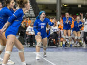 La Center's Grace Clinton (10) yells in celebration as the Wildcats score against Lakeside of Nine Mile Falls in the consolation bracket of the 1A state volleyball tournament in Yakima on Saturday, Nov. 12, 2022.