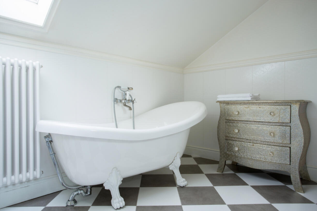 Luxury bathtub options include hot tubs, whirlpool tubs or clawfoot soaking tubs such as this one.