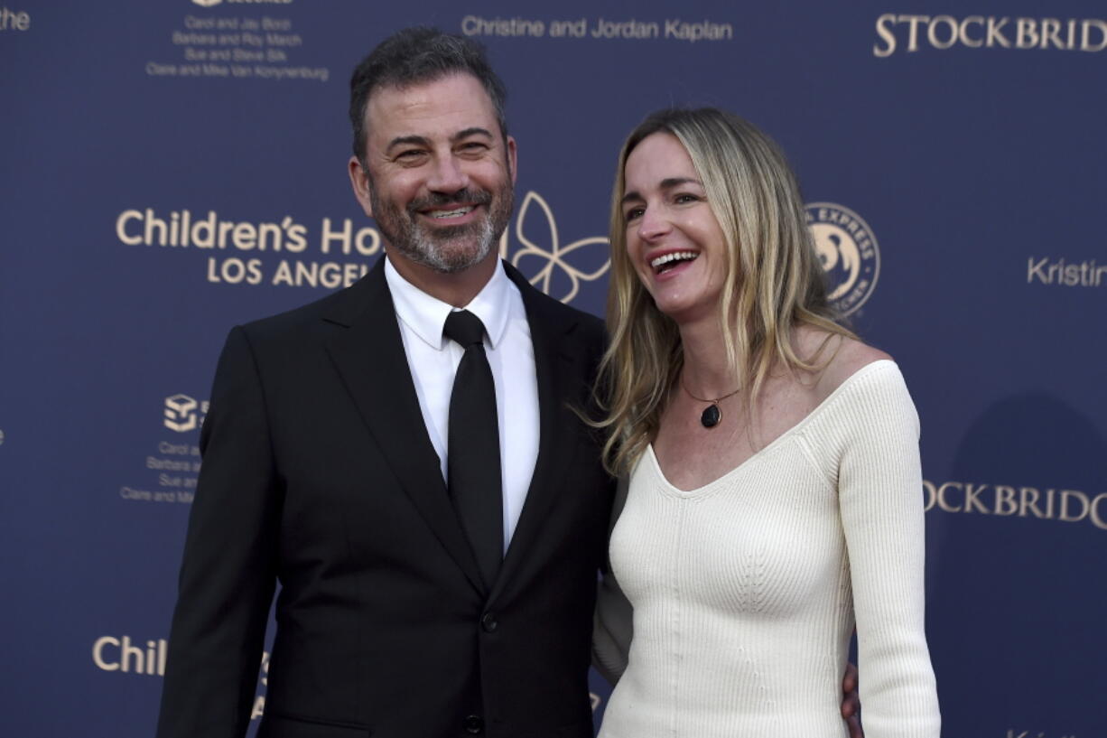 Jimmy Kimmel, left, and Molly McNearney arrive at the 2022 Children's Hospital Los Angeles Gala, Saturday, Oct. 8, 2022, at Barker Hanger in Santa Monica, Calif.