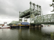 Upstream manufacturers have counted on the Interstate 5 Bridge's twin lift spans to be able to move large items, like this oil drilling equipment en route to Alaska in 2011.