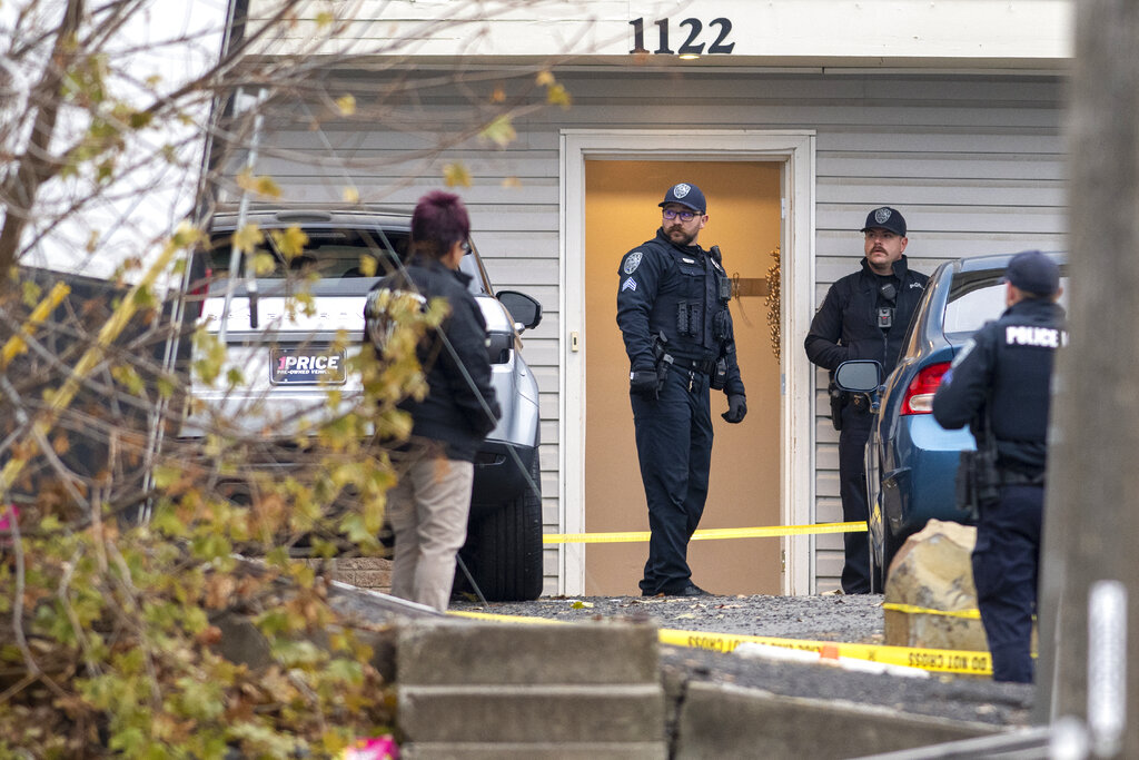 Officers investigate a homicide at an apartment complex south of the University of Idaho campus on Sunday, Nov. 13, 2022. Four people were found dead on King Road near the campus, according to a city of Moscow news release issued Sunday afternoon.