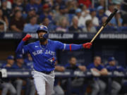 Toronto Blue Jays' Teoscar Hernandez reacts while batting during a baseball game Sept. 24, 2022, in St. Petersburg, Fla. The Seattle Mariners made one of the first big moves of the offseason by acquiring All-Star outfielder Teoscar Hernandez from the Blue Jays in exchange for two pitchers on Wednesday, Nov. 16, 2022.