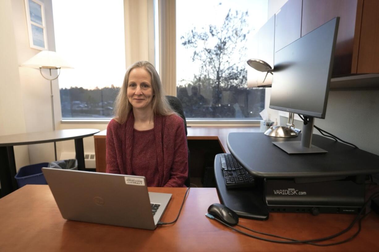 Kara Zivin, a University of Michigan professor of psychiatry, obstetrics and gynecology, and health management, sits in her office in Ann Arbor, Mich., Monday, Nov. 7, 2022. Zivin co-authored a study published in 2021 that found that suicidal thoughts and behavior among commercially insured U.S. individuals before, during and after pregnancy were rising. The rates were low, but they increased among those with anxiety or depression from 1 per 10,000 in 2006 to almost 3 per 10,000 in 2017.