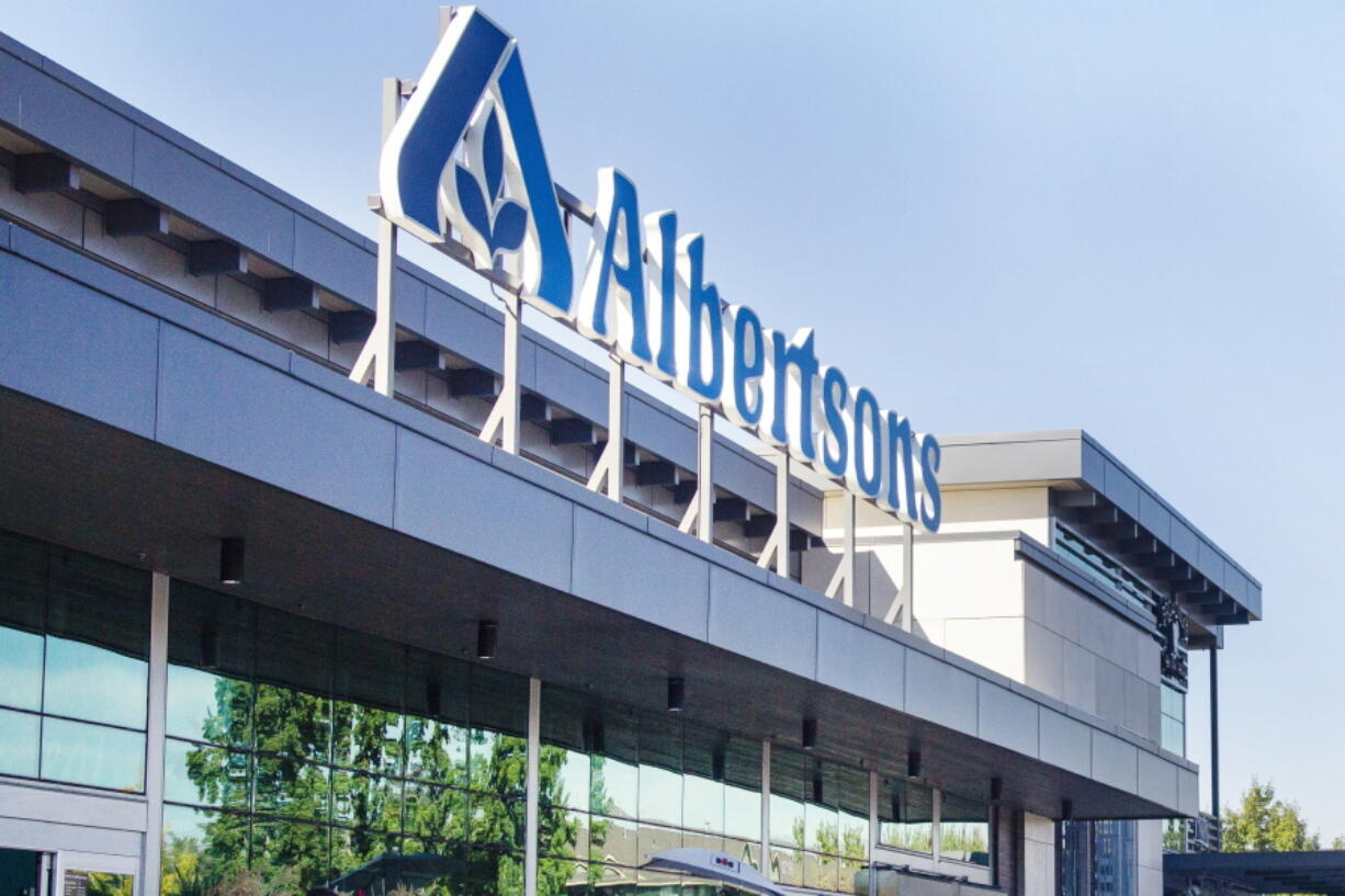 An Albertsons grocery store is seen in Boise, Idaho, on Oct. 14, 2022. The attorneys general of California, Illinois and the District of Columbia are suing Albertsons in an effort to stop the grocery chain from paying a nearly $4 billion dividend to its shareholders, according to a lawsuit filed Wednesday, Nov. 2, 2022. (Sarah A.