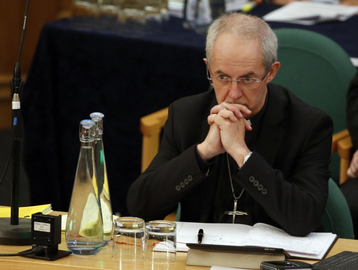 FILE - The Archbishop of Canterbury Justin Welby listens to debate at the General Synod in London, on Feb. 13, 2017. Less than half of people in England and Wales consider themselves Christian, according to the most recent census - the first time the country's official religion has been followed by a minority of the population. Figures from the 2021 census released Tuesday, Nov. 29, 2022, by the Office for National Statistics reveal that Britain has become less religious, and less white, in the decade since the last census in 2011.