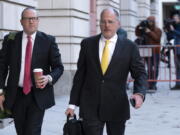 Attorneys of Oath Keepers leader Stewart Rhodes, James Lee Bright, left, and Phillip Linder, arrive at the Federal Courthouse during the Rhodes trial in Washington, Monday, Nov. 28, 2022. Jury deliberations are underway.