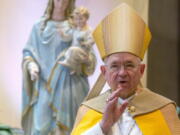 FILE - In this Friday, May 1, 2020 file photo, Archbishop Jose H. Gomez gives a blessing after leading a brief liturgy at the Cathedral of Our Lady of the Angels in Los Angeles. The nation's Catholic bishops begin their fall annual meeting Monday, Nov. 14, 2022, where they plan to elect new leaders -- a vote that may signal whether they want to be more closely aligned with Pope Francis' agenda or maintain a more formal distance.