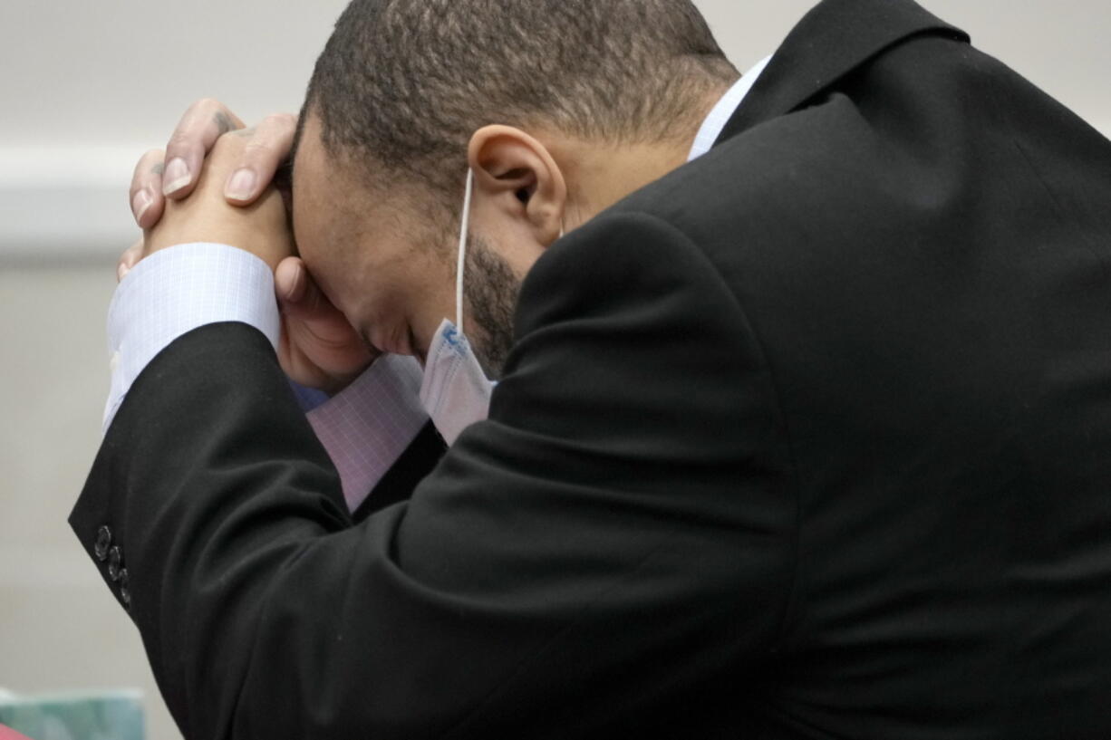 Darrell Brooks reacts as the guilty verdict is read during his trial in a Waukesha County Circuit Court in Waukesha, Wis., on Wednesday, Oct. 26, 2022. Dozens of people are expected to speak at sentencing proceedings for Brooks, who is convicted of killing six people when he drove his SUV through a Christmas parade in suburban Milwaukee last year. He will face six mandatory life terms when Judge Jennifer Dorow sentences him on Wednesday. Dorow set aside Tuesday for victims and their families to address Brooks, marking the first time they will be allowed to confront him.